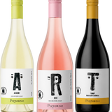 Three Pizzorno white wine bottles in a row, showing the white, pink, and black grape varieties. The bottles have white labels with black lettering and colored neck bands (yellow-green, pink, and gold).