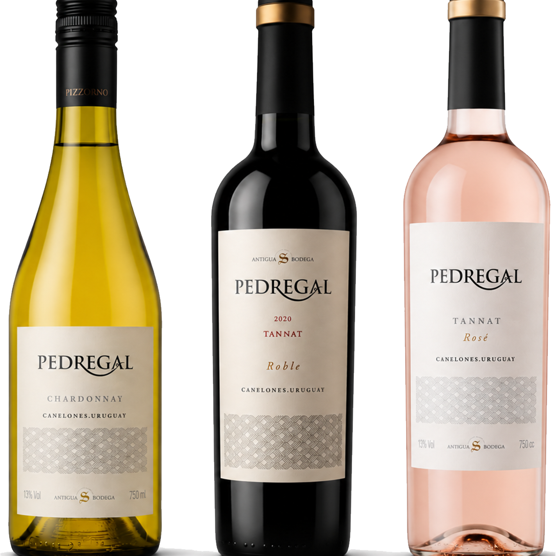 Three Pedregal wine bottles on a white background: a yellow-green Chardonnat, a dark red Tannat 2020, and a pale pink Rosé. The center bottle is slightly larger and more prominent than the other two.
